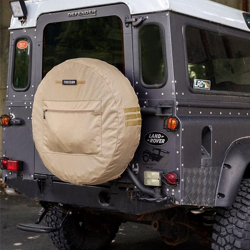 Spare tire cover with large capacity storage bag